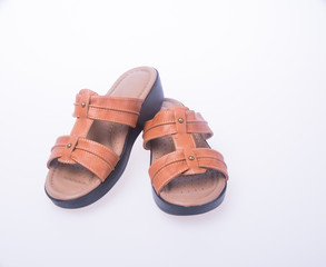 shoe. Brown colour fashion woman shoes on a background.