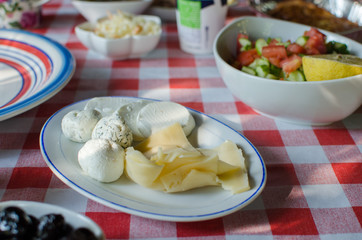mediterranean breakfast on checkered tablecloth