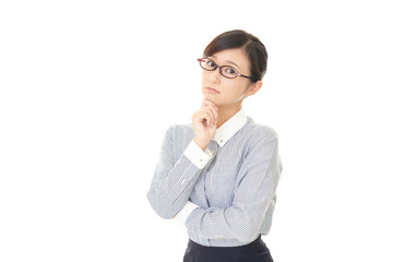 悩むビジネスウーマン