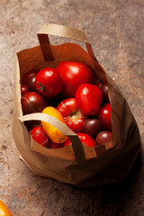 Fresh ecological different sorts of tomatoes for use as cooking ingredients. Shopping concept.