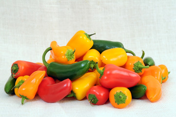 orange, yellow and red bell pepper