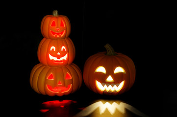 pumpkin lantern for Halloween glowing in dark