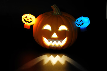 pumpkin lantern for Halloween glowing in dark