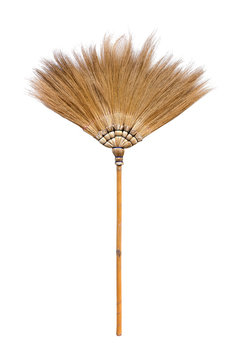 Natural straw  broomstick isolated on white background