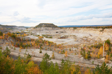 Aerial view of the quarry in autumn day. Autumn landscape.