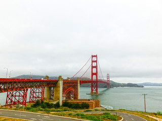 The gold gate bridge in a fog in San Francisco