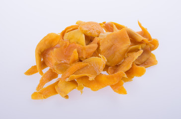mango dry or dried mango slices on background.
