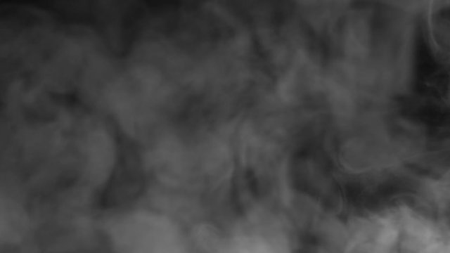 Real white steam looking like smoke isolated on black background. Clouds of white fantasy smoke abstract magic mystic fog toxic gas fumes pollution. Slow motion. Camera locked down. Recorded in 60fps