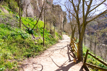 Path with wooden railing in the countryside, in the city of Cuenca, spain