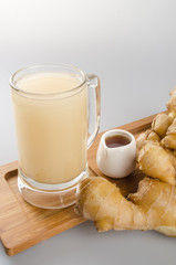 Ginger tea or Ginger tea with haney on background.