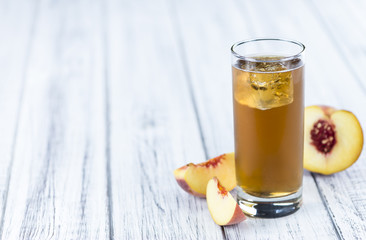 Peach ice tea (selective focus)