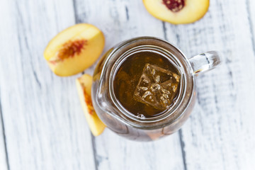Peach ice tea (selective focus)