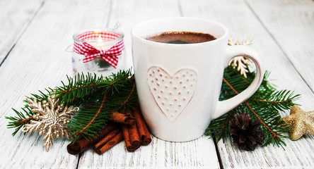 Cup of coffee and christmas decoration