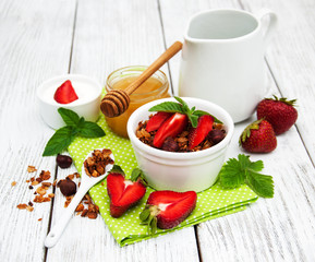 Homemade granola with strawberries