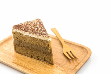 Coffee cake slice in wooden plate.