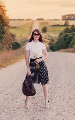 girl with flowers on road