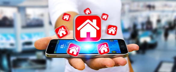 Businessman using modern mobile phone to rent a flat