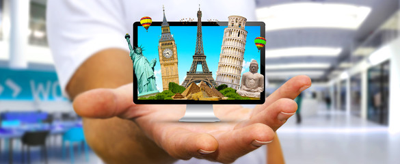 Man travelling the world with his computer