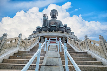 Fototapeta premium Tian Tan Buddha, Big Buddha in Hong Kong on big blue sky background