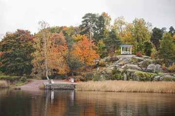 Fototapeta na wymiar Gazebo in Monrepo (Mon Repos) manor Vyborg park. Autumn landscap