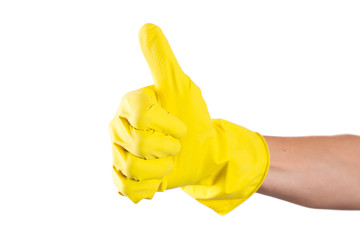 yellow glove for cleaning on womans arm show thumbs up
