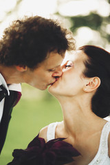  Bride and groom kissing