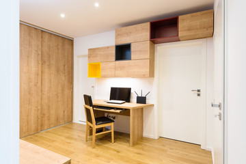 interior of modern apartment with computer table