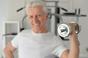 Elderly man in  gym