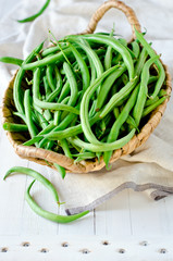 Green beans in a wicker basket