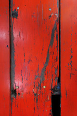 Old wood board painted red