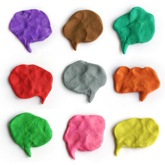 Set of plasticine colorful speech bubbles. Modeling clay handmade talk clouds isolated on white background.  - 122838649