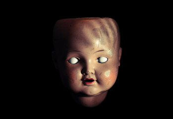 Creepy doll face