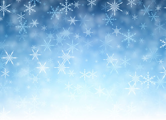 Blue winter background with snowflakes.