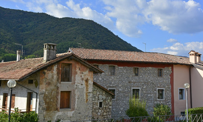 Fototapeta na wymiar An old historic building in the Italian village of San Pietro al Natisone, Friuli Venezia Giulia. 