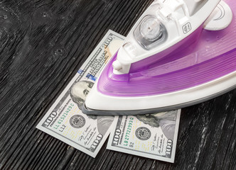 iron smoothing dollars