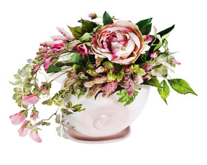 Colorful floral arrangement in a pink ceramic vase, isolated on white background.