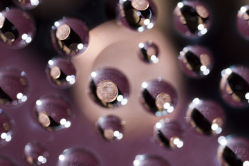 Money, euro reflected in a drop of water
