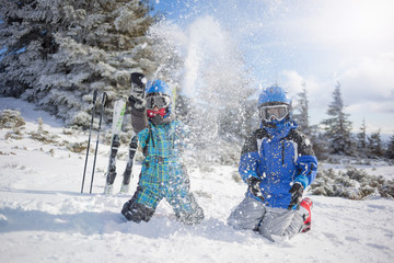  happy family ski team fun on beautiful mountain