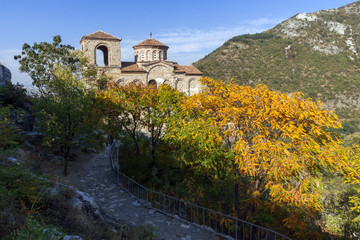 Fototapeta premium Autumn landscape of Church of the Holy Mother of God in Asen's Fortress, Asenovgrad, Plovdiv Region, Bulgaria
