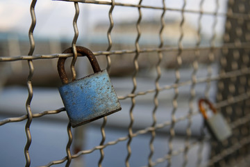 love padlocks chained to bridge