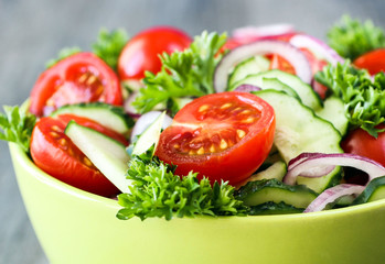 The salad of fresh vegetables close-up