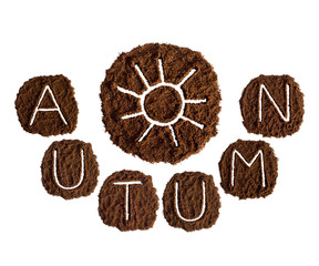Autumn and sun, decorated with ground coffee on white background