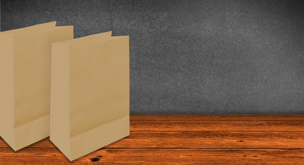 two shopping bags on wooden planks