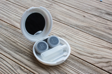 Case for contact lenses for the eyes with  mirror, bottle and sh