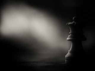 Abstract monotone color and Selective focus of old wooden chess pieces on a chess board, Business...