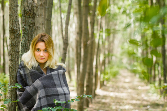 young woman in forest