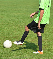 Soccer player with a ball