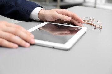 Businessman with tablet in office
