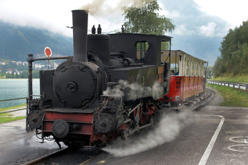Fototapeta na wymiar Steam locomotive of a narrow-gauge railway in Austria
