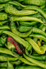 Pile of spicy green hot chili peppers